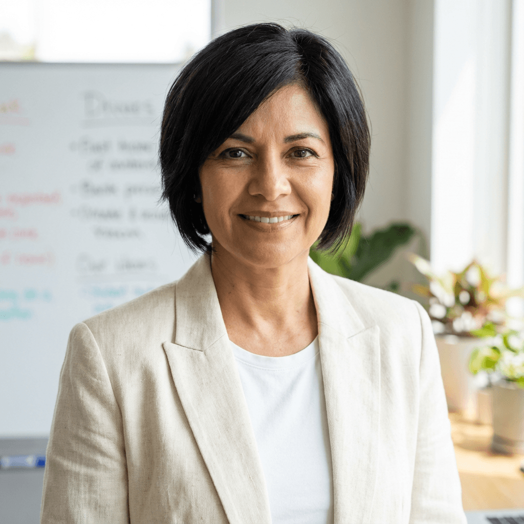 Angela Torres in a bright office setting